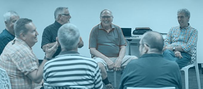 Men sitting around and chatting